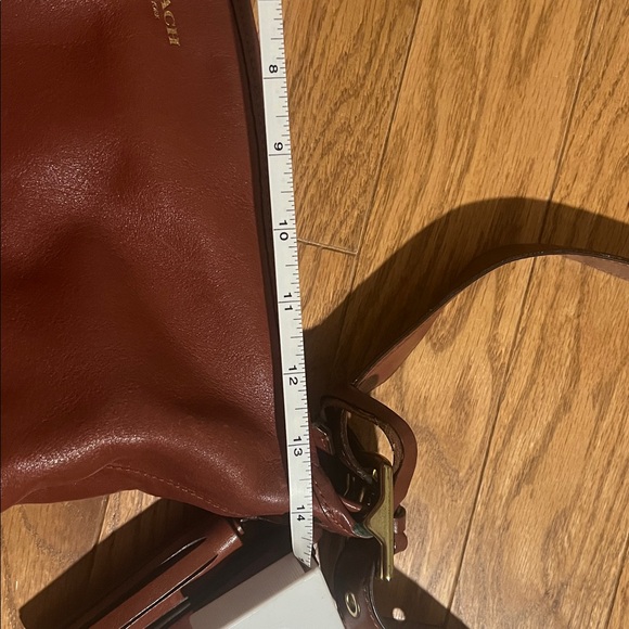 Saddle-color Coach Crossbody Bucket - Picture 11 of 14